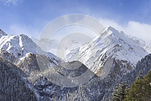 Alpine landscape view with snowy peaks