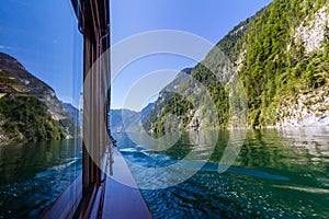 Alpine mountain background and lake Obersee in Summer, Konigsee National Park, Bayern, Germany photo