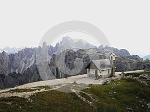 Alpine panorama of Cappella degli Alpini mountain chapel and Cadini di Misurina at Tre Cime Dolomites South Tyrol Italy