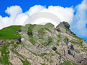 Alpine peaks Chli Haupt Murmelchopf and Haupt or BrÃÂ¼nighaupt Bruenighaupt oder Brunighaupt in the Uri Alps mountain massif