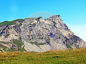 Alpine peaks Chli Haupt Murmelchopf and Haupt or BrÃÂ¼nighaupt Bruenighaupt oder Brunighaupt in the Uri Alps mountain massif