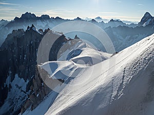 Alpine peaks and climbing trail over the glacier