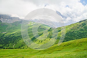 Alpine peaks landskape background. Jungfrau, Bernese highland. Alps, tourism, journey, hiking concept.