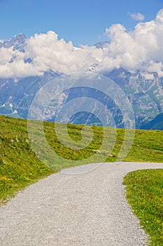 Alpine peaks landskape background. Jungfrau, Bernese highland. Alps, tourism, journey, hiking concept.