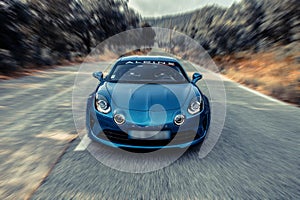 Alpine A110 on the road