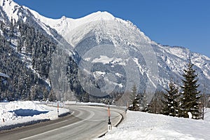 Alpine road in winter scenery