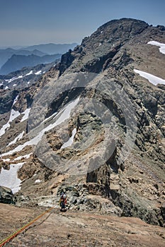Alpine Rockclimber Rappels in the Cascade Mountains