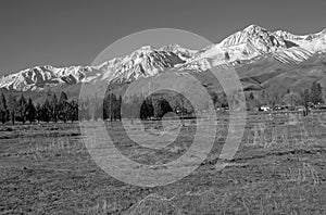 Alpine scene with snow capped mountains