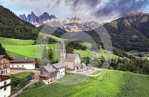 Alpine scenery of breathtaking Dolomites rocks mountains in Italian Alps, South Tyrol, Italy. Aerial view of Val di Funes