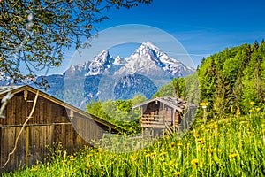 Alpine scenery with mountain hut in summer