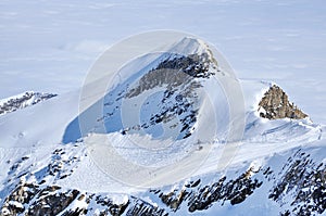 Alpine ski piste and slopes in mountains