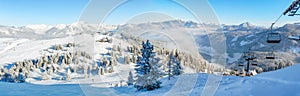 Alpine ski slope mountain winter panorama with ski lift