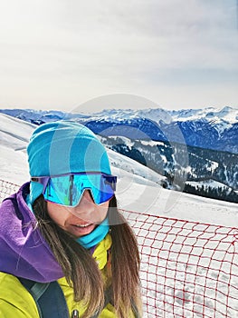 Alpine Skier Selfie with Mountain Range