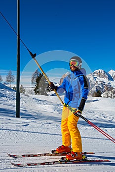 Alpine skier with T-bar lift