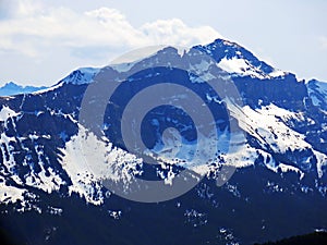 Alpine snowy peak Hochfinsler in the Glarus Alps mountain range, Flums - Canton of St. Gallen, Switzerland - Kanton St. Gallen