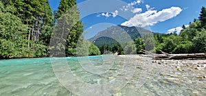 alpine stream with crystal blue water