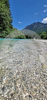 alpine stream with crystal blue water