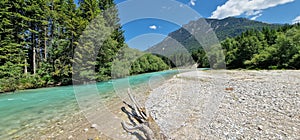 alpine stream with crystal blue water