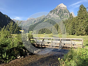 Alpine stream Sulzbach in a Oberseetal mountain valley and in the Glarnerland tourist region, Nafels Naefels photo