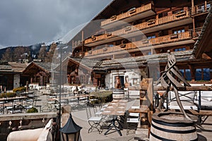 Alpine style outdoor dining terrace in mountainous region