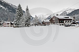 Alpine village in winter with snow, Macugnaga, north Italy