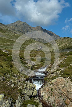 Alpine waterfall at the Fluelapass in Switzerland 12.8.2020