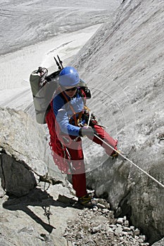 Alpinist on glacier. photo