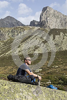 Alpinist meditates according to the meaning of life