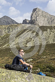 Alpinist meditates according to the meaning of life