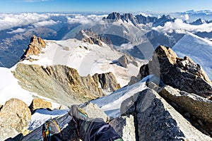 Alpinist mountaineer feet mountain summit landscape Mont Blanc