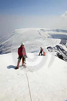 Alpinist on the top of Ostriy Tolbachik volcano. photo