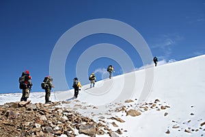 Alpinists at the climbing in Caucasus mountains photo