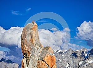 Alpinists climbing on rocks at Aiguille du Midi, Chamonix, France photo