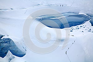 Alpinists on a glacier photo