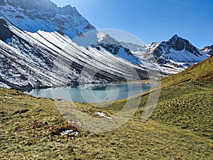 Alplisee above Arosa. Hiking in autumn between Arosa Parpaner Weisshorn and Lenzerheide. Beautiful mountain landscape.