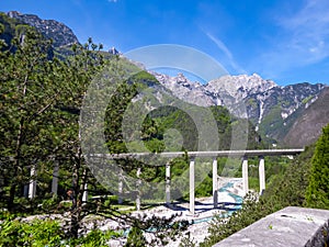 Alps Adria - Scenic view of river Tagliamento and highway bridge seen from Ciclovia Alpe Adria bike trail