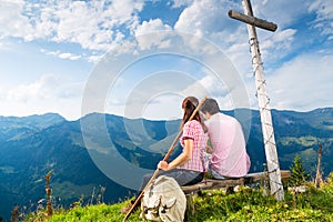 Alps - Hiking Couple takes break in mountains