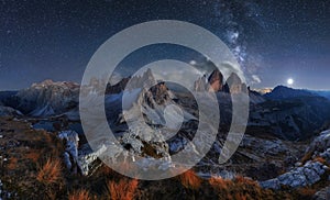 Alps Mountain landscape with night sky and Mliky way, Tre Cime d photo
