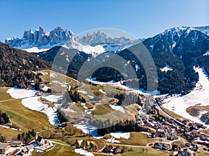 Alps mountain Santa Maddalena village with Dolomites in background, Trentino Alto Adige region, Funes valley, Italy.