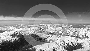 Alps mountainrange from above, black and white photo