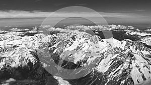 Alps mountainrange from above, black and white photo