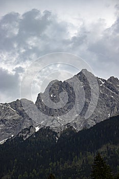 Alps, mountains with stormy skies, leaden heavy skies
