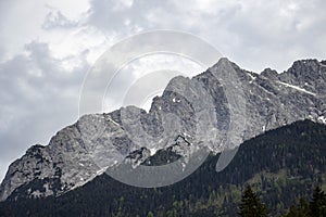 Alps, mountains with stormy skies, leaden heavy skies