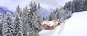 Alps, ski slope winter mountain landscape, house