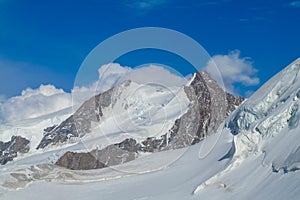 Alps snow mountains in Italy, Matterhorn or Monte Cervino and Monte Rosa area summits