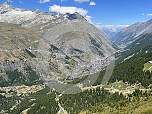 Alps Village in a valley surrounded by mountains 4