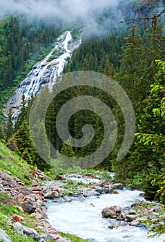 Alps waterfall summer view