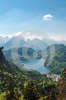 Alpsee Lake surrounded by Alpine mountains