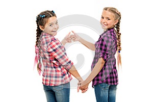 Alright thumb up. Fashionable cutie. Happy childhood. Keep hair braided. Sisters with long braided hair. Hairdresser