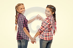 Alright thumb up. Fashionable cutie. Happy childhood. Keep hair braided. Sisters with long braided hair. Hairdresser